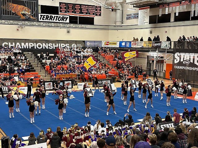 Moses Lake High School cheerleading hits the floor for its performance in the 3A/4A Gameday Coed event at Saturday’s WIAA State Cheerleading competition. The Mavericks finished first, taking home two state titles.