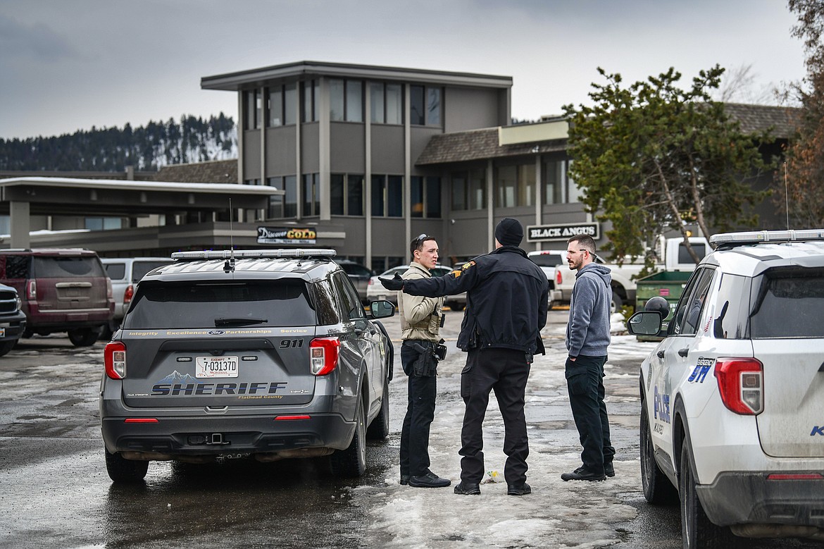 Law enforcement outside the scene of a shooting at a hotel along U.S. Highway 2 West in Kalispell on Tuesday, Feb. 7. (Casey Kreider/Daily Inter Lake)