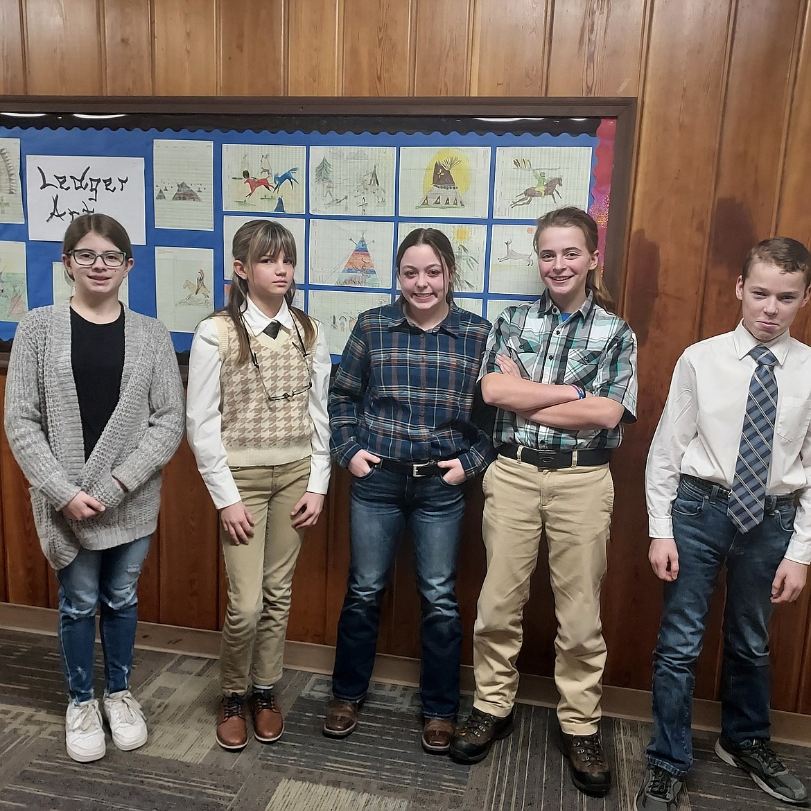 It was spirit week at Libby Public Schools. Tuesday was "Dress like the staff Day." From left, are some of the students and the names of the teachers they portrayed, Alli Clemons (Mrs. Boone), Vivian Cole (Mr. Mee), Hadleigh Wood (Mr. Knapp), Teighler Parker (Mr. Moe) and Ashton Rehl (Mr. Germany). (Photo courtesy Libby Public Schools)