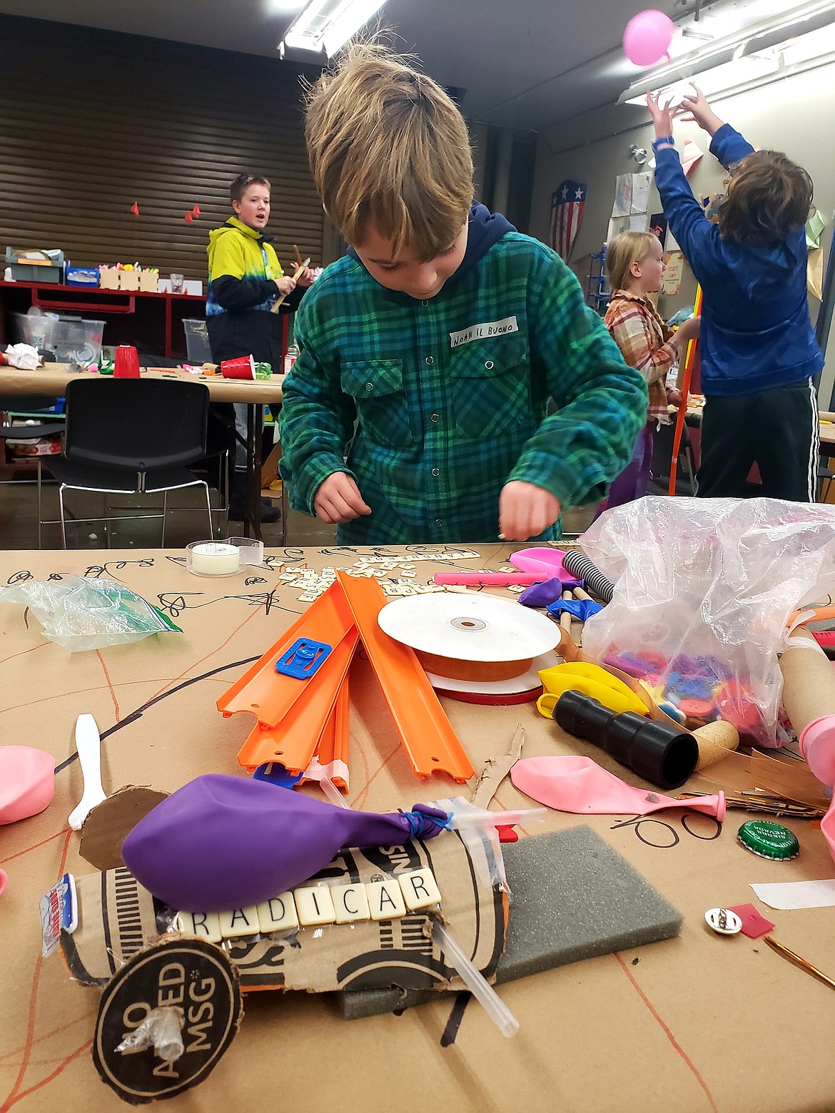 Noah Wilkonson builds a RadiCar with his brother for Tinker Time on Monday at the Gizmo Coeur d'Alene makerspace at North Idaho College. Up to 20 kids can attend the free after school program starting at 4 p.m. Mondays. Classes fill up quick when registration opens at 6 p.m. the week prior.