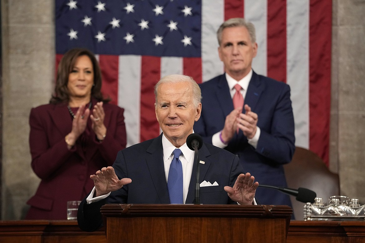 President Joe Biden delivers the State of the Union address to a joint session of Congress at the U.S. Capitol, Tuesday, Feb. 7, 2023, in Washington, as Vice President Kamala Harris and House Speaker Kevin McCarthy of Calif., applaud. (AP Photo/Jacquelyn Martin, Pool)