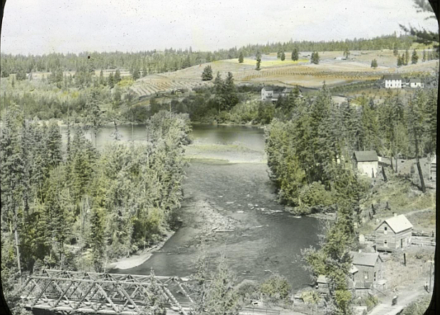 An early view, around 1906, of Bigfork taken my Morton J. Elrod. This view shows the fields, in the distance, owned by E.L. Sliter that would eventually become the home of the Bigfork schools. (Photo Credit – Montana Memory Project taken from the Special Collections at the Mansfield Library – University of Montana)