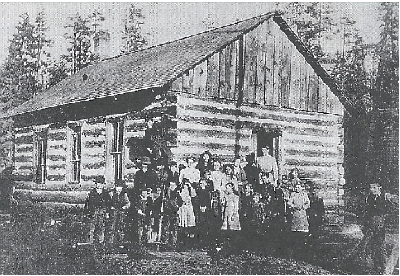 Swan River School and students circa 1900. (Credit – Lloyd Fagerland Collection)