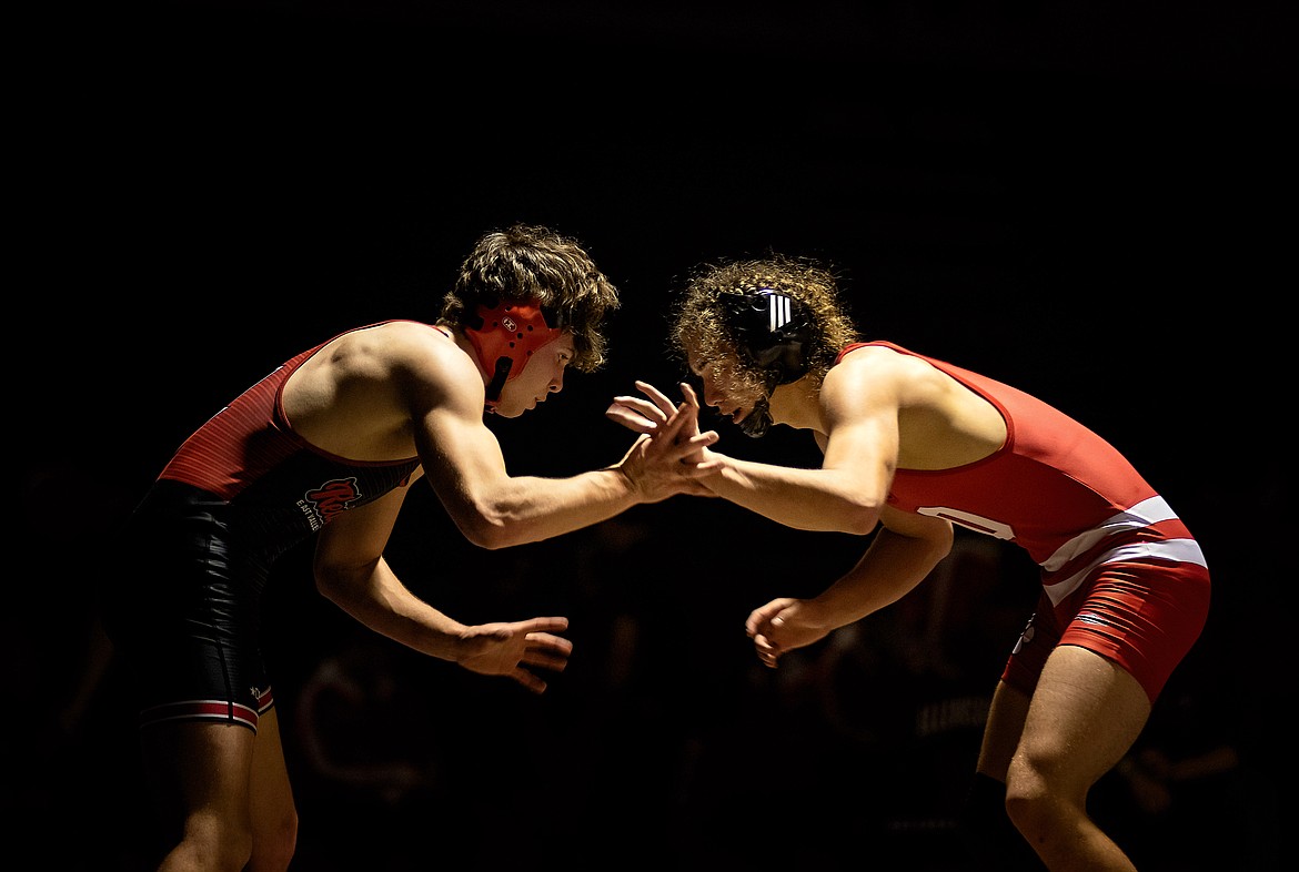 Othello freshman Camilo Mendez, right, was a 145-pound district champion after winning by decision over East Valley’s John Dobie at the Central Washington Athletic Conference District Tournament.