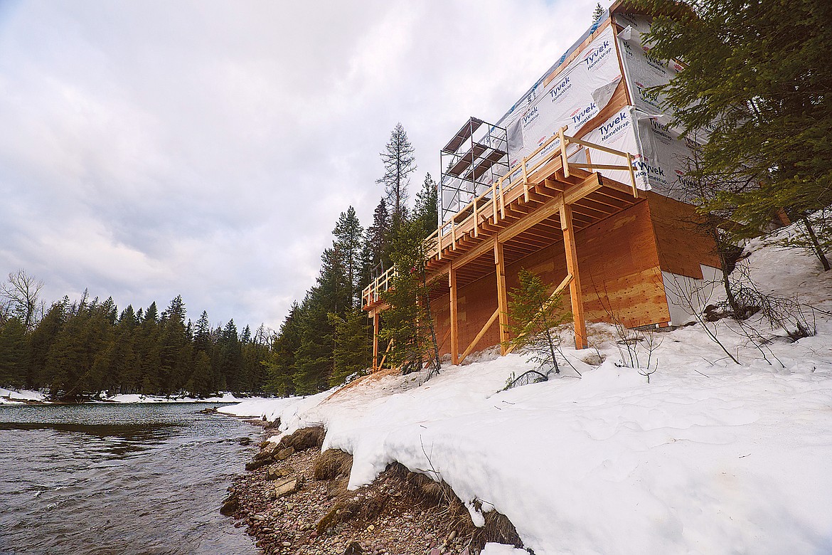 A home under construction along McDonald Creek in Glacier National Park. (Chris Peterson/Hungry Horse News)