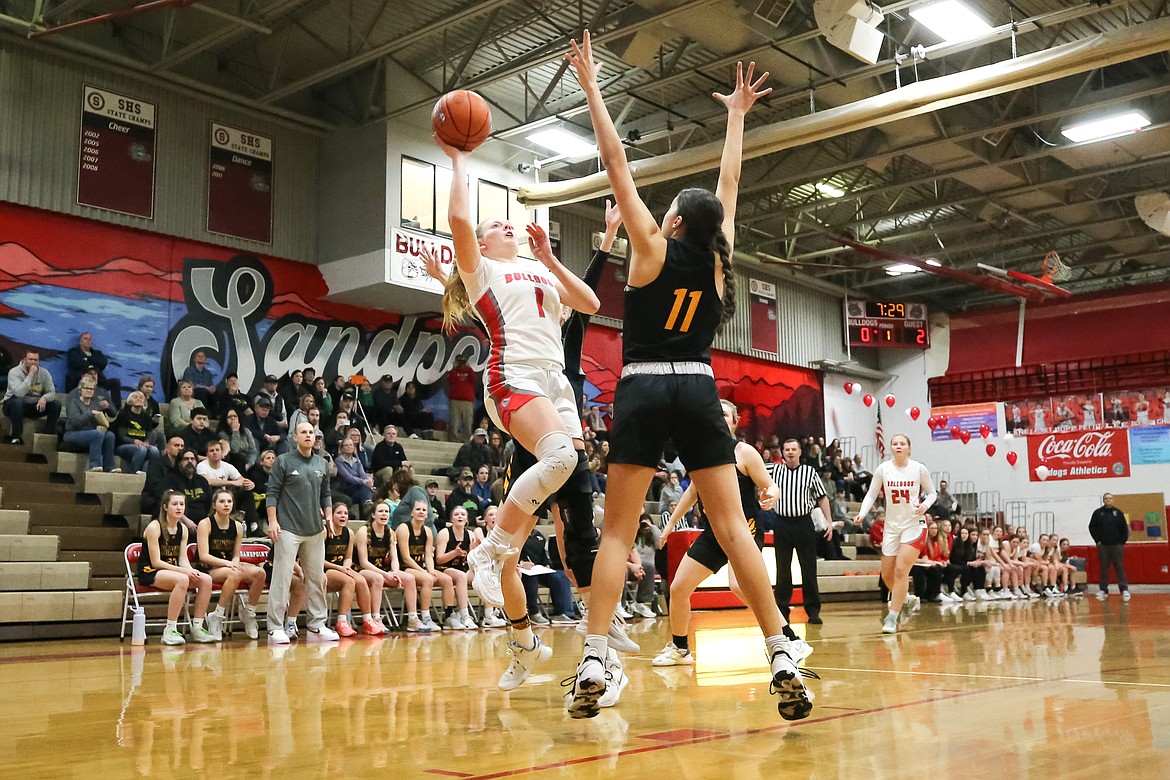 Kelsey Cessna goes up for a shot against Lakeland during Wednesday nights district game.