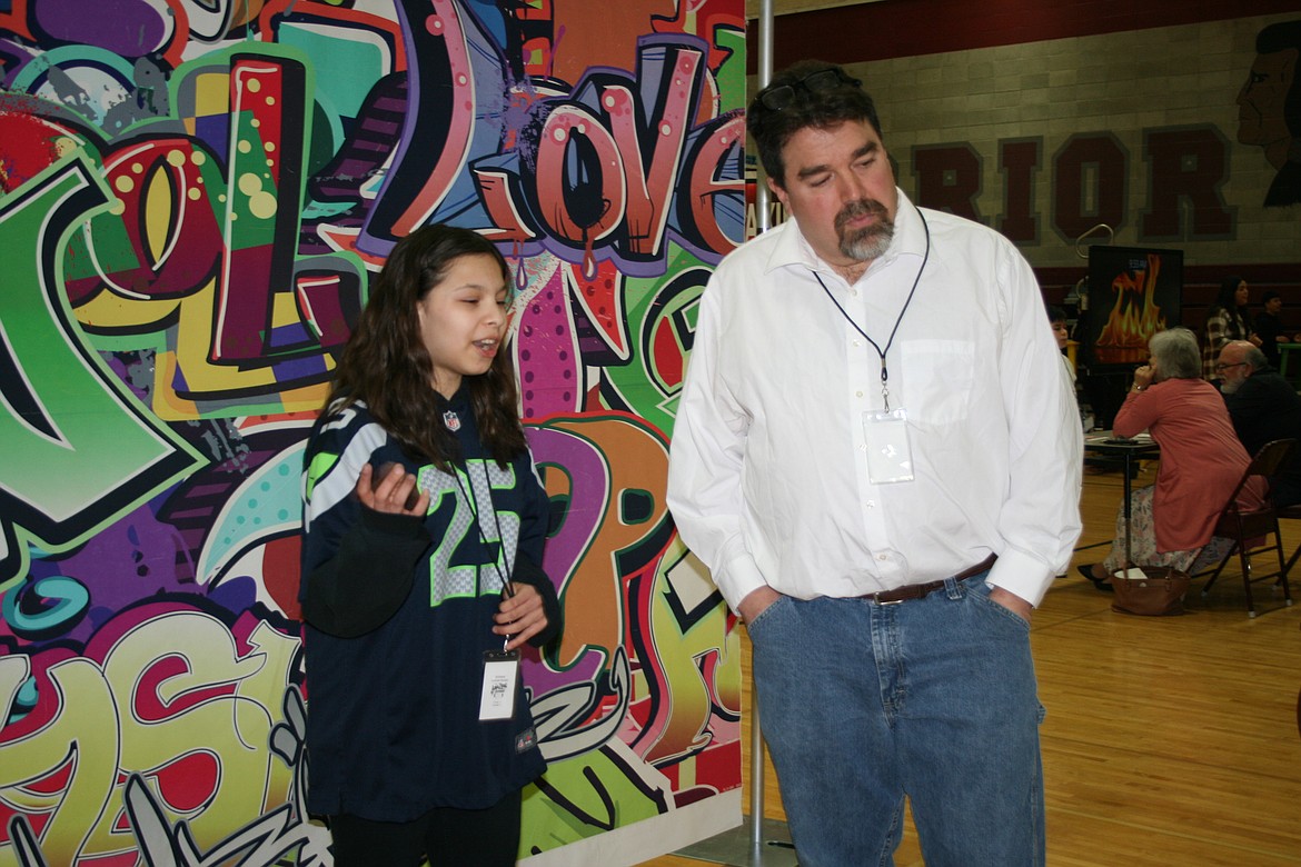 Brianna Andrade, left, tests her recall skills during the Amazing Shake competition.