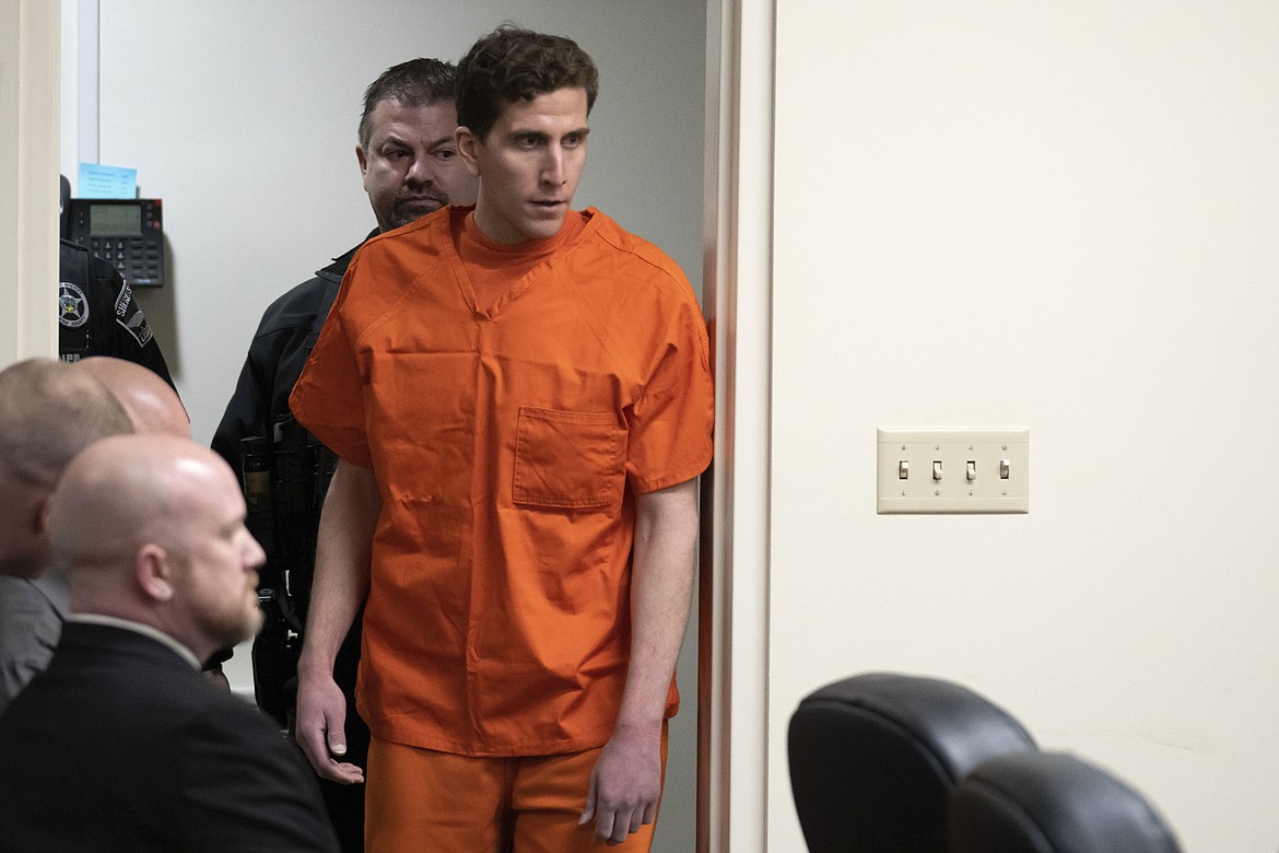 Bryan Kohberger, who is accused of killing four University of Idaho students in Nov. 2022, appears at a hearing in Latah County District Court, on Jan. 5, 2023, in Moscow, Idaho. Thirty news organizations have asked the Idaho Supreme Court to overturn a sweeping gag order in a case against Kohberger who is accused of stabbing the four students to death. (AP Photo/Ted S. Warren, Pool, File)