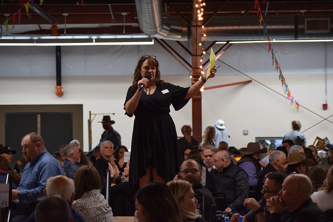 Columbia Basin Cancer Foundation Executive Director Angel Ledesma addresses visitors at the annual Country Sweethearts benefit. The event featured silent and live auctions, a catered meal and dancing. Proceeds will go to support the foundation’s efforts to help Columbia Basin residents facing cancer treatment.