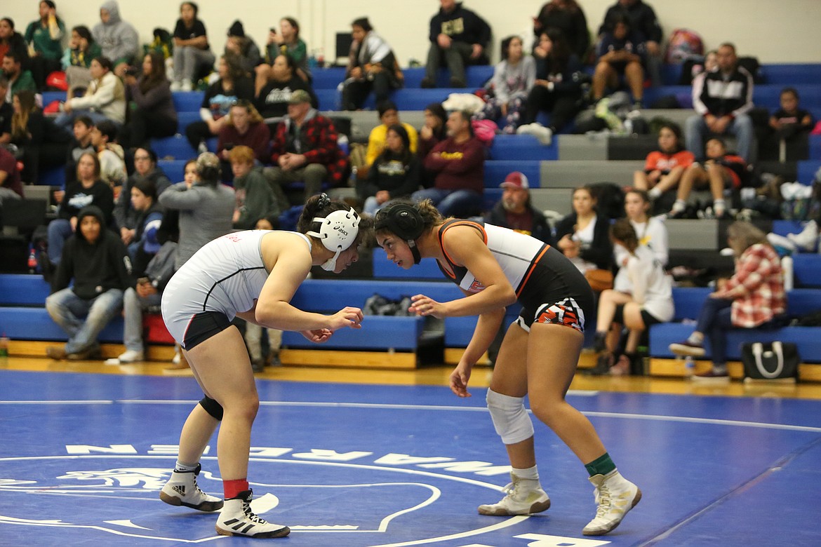 Othello senior Marsha Gomez, left, and Ephrata junior Leslie Sanchez Guerrero both qualified for regional competition this weekend. Othello will wrestle at Warden High School in the 2A/1A/2B/1B Region 3 tournament, while the Tigers travel to Spokane at Rogers High School in the 2A/1A/2B/1B Region 4 tournament.