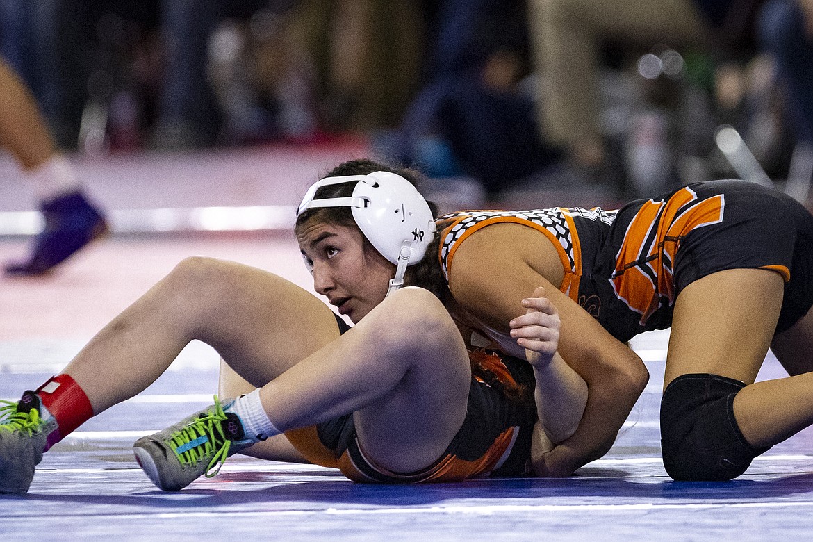 Ronan's Saellah Nomee wrestles Eureka's Samantha Day during the first day of the All-Class State Tournament at First Interstate Arena in Billings on Friday, Feb. 10. (Mike Clark/406mtsports.com)