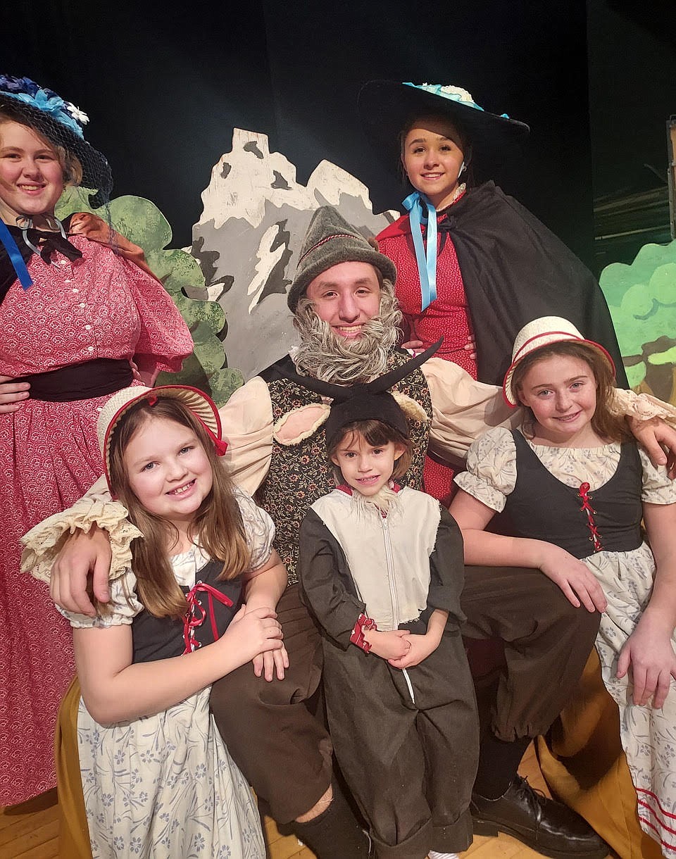 Seventy Polson students appeared in the 2023 production of "Heidi," including: Bethany Butler and Ellie Dupuis (standing), Kayla Grainey and Scarlett Anciaux, who each played Heidi with Kai McDonald (center) as Grandfather, and Ruby Epperson as one of Grandfather’s goats. (Karen Lewing photo photo)