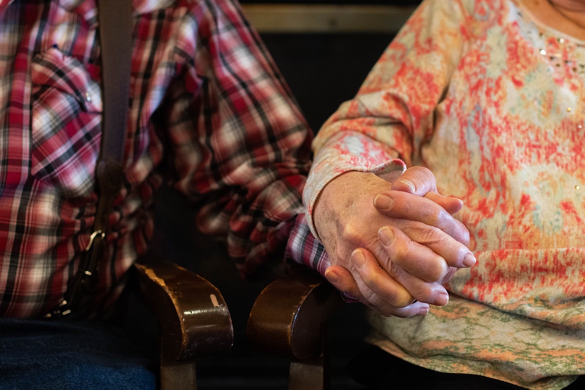 Jim and Kathleen Ott hold hands on Feb 8, 2023. (Kate Heston/Daily Inter Lake)