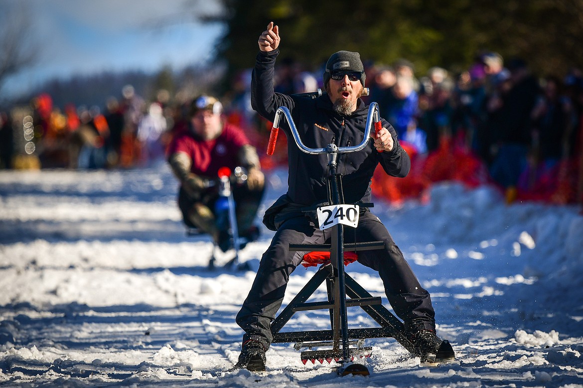 Participants race down Sugar Hill during the Barstool Ski Races at Cabin Fever Days in Martin City on Saturday, Feb. 11. (Casey Kreider/Daily Inter Lake)