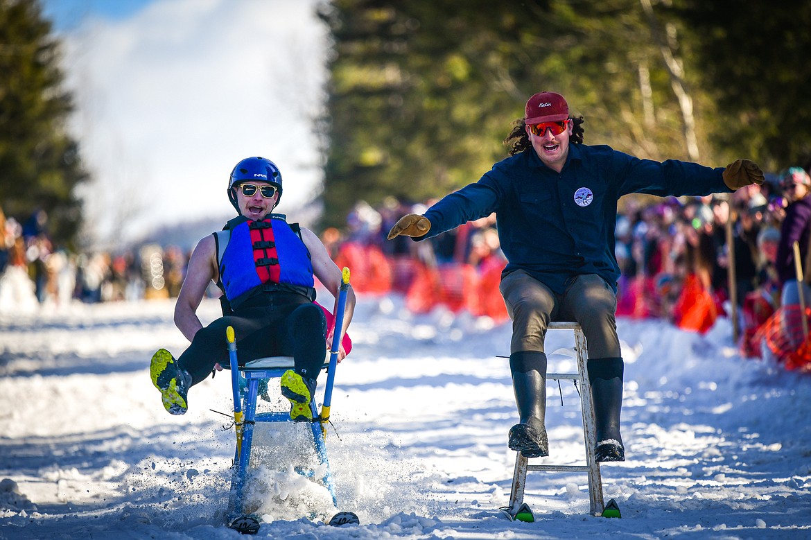 Participants race down Sugar Hill during the Barstool Ski Races at Cabin Fever Days in Martin City on Saturday, Feb. 11. (Casey Kreider/Daily Inter Lake)