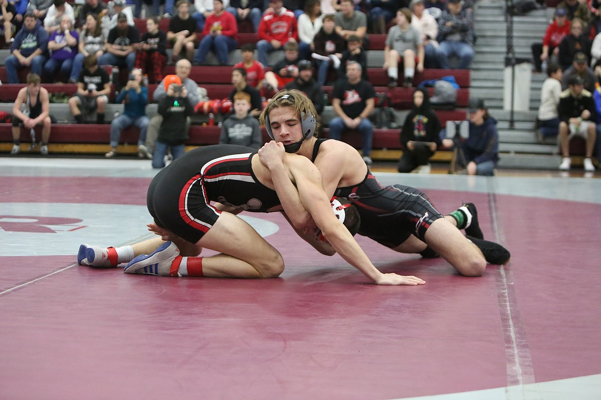 Almira/Coulee-Hartline senior Tristen Wood, right, defeated Liberty (Spangle) senior Kellen Tee, left, in the first round of the 145-pound bracket at Saturday’s 2B/1B Region 3 tournament in Reardan.