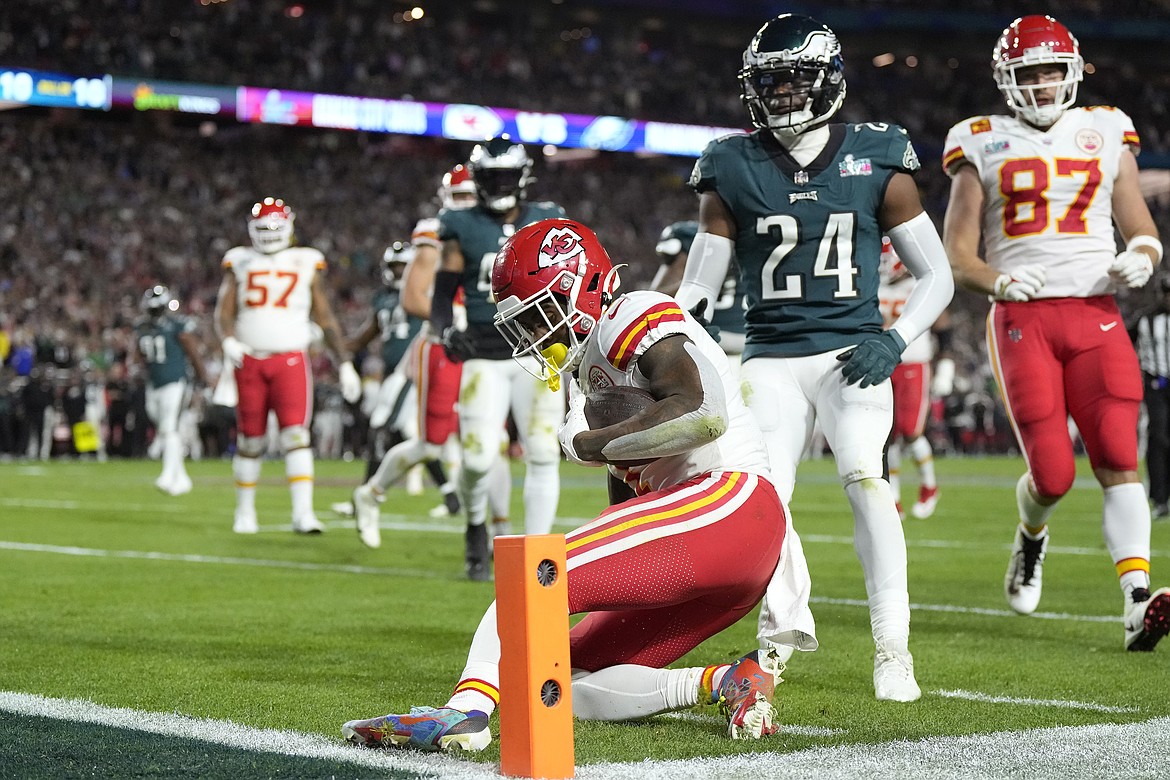 Kansas City Chiefs running back Jerick McKinnon, foreground, stops short of the goal line on a run against the Philadelphia Eagles during the second half of the NFL Super Bowl 57 football game, Sunday, Feb. 12, 2023, in Glendale, Ariz.