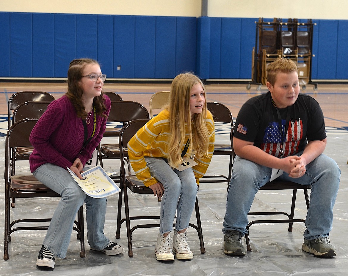 Excitement mounts among finalists Johanna Robine, Kylie Cox and Nathan Alder in the final round of the Lake County Spelling Bee. (Kristi Niemeyer/Leader)