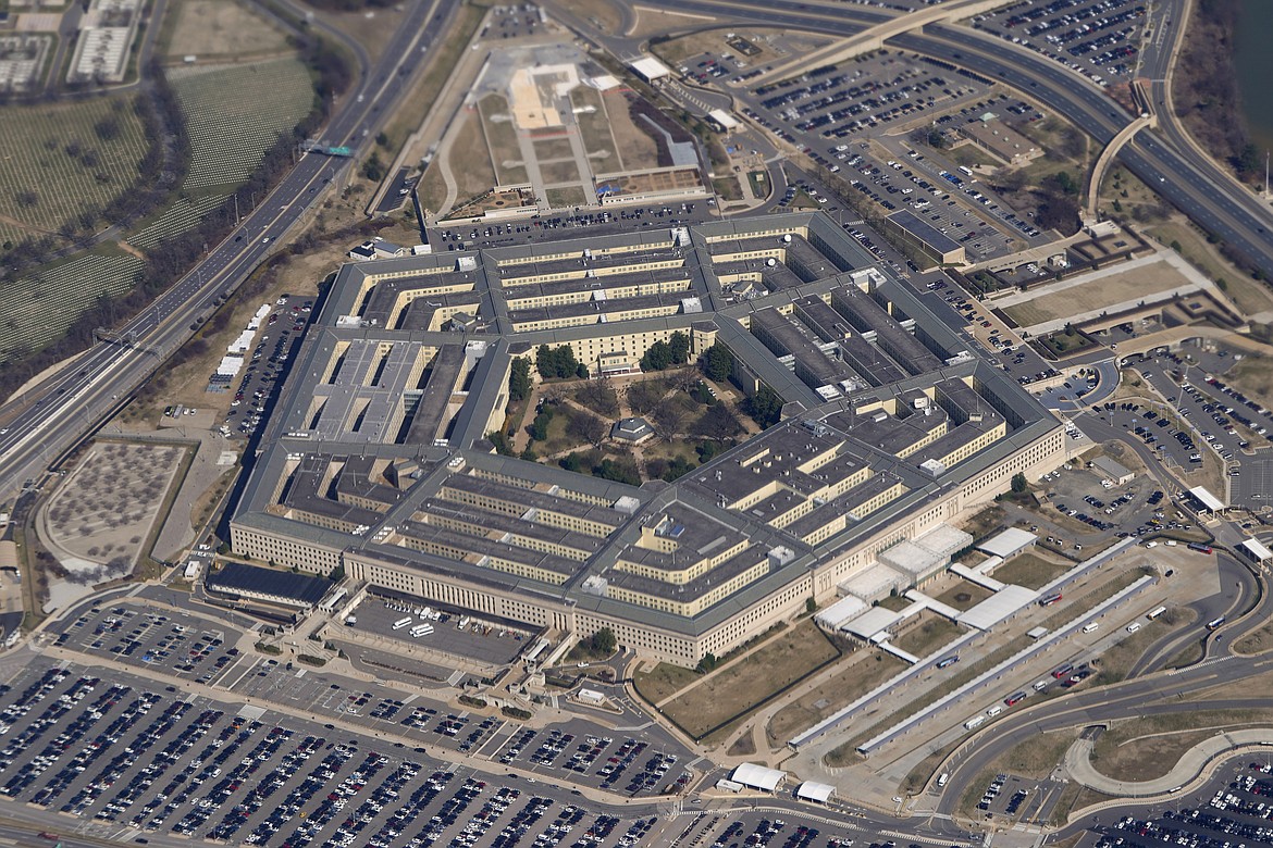 The Pentagon is seen from Air Force One as it flies over Washington, March 2, 2022. U.S. officials say an “unidentified object” has been shot down Sunday for the third time in as many days, this time over Lake Huron, after earlier downings in Alaska and Canada. (AP Photo/Patrick Semansky, File)