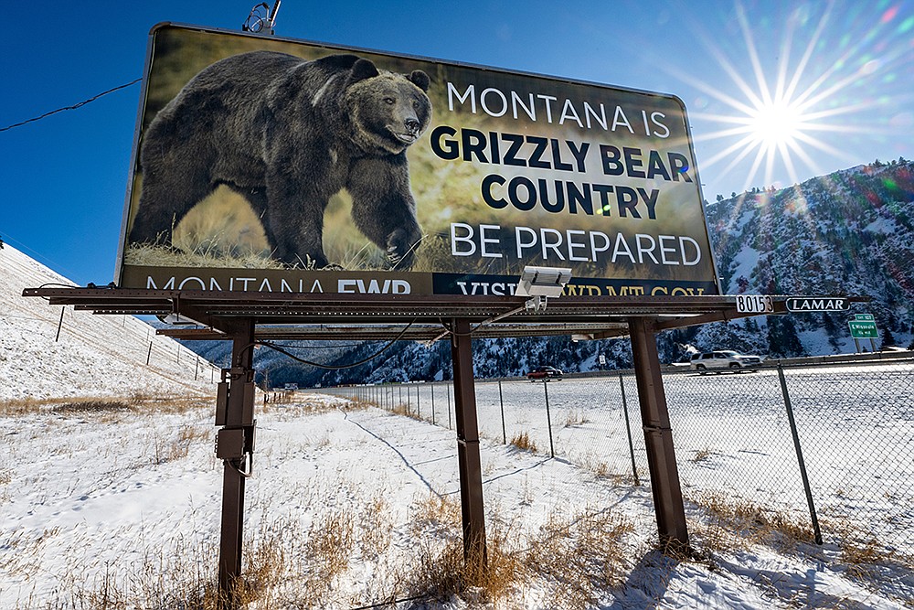 A highway billboard in Missoula reminds motorists that grizzly bears are a reality of life in the Treasure State. (UM News Service)