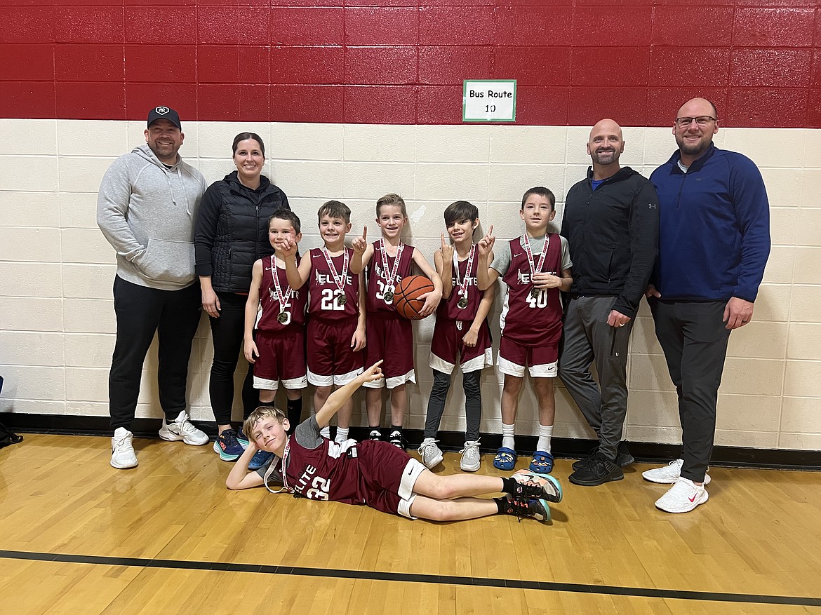 Courtesy photo
The North Idaho Elite third/fourth grade AAU boys basketball team won the Sandpoint Invitational on Jan. 28-29. In the front is Kellan Larsen; and standing from left, assistant coach Todd Bateman, coach Angie Gatten, Bridger Gatten, Cason Bishop, Easton Bateman, Steele Steenstra, Beck Odenthal, assistant coach Ryan Bishop and coach Jason Steenstra.