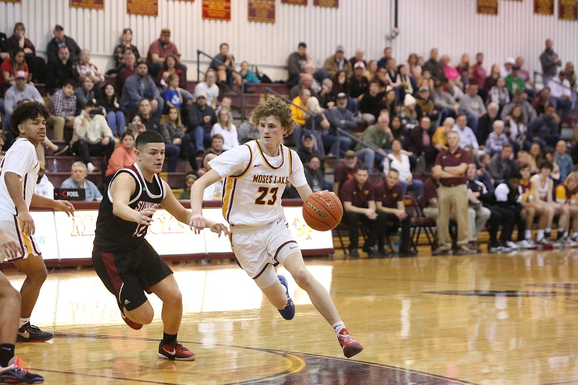 Moses Lake senior Blaine Macdonald drives toward the rim against Sunnyside on Jan. 27.