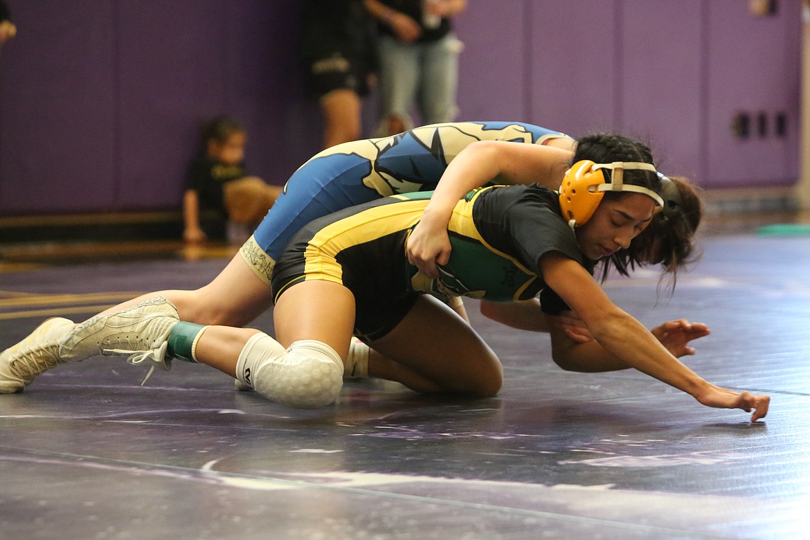 Quincy’s Alondra Cordova, bottom, is on to state after placing third in the 2A/1A/2B/1B Region 4 tournament on Saturday at Rogers (Spokane) High School.