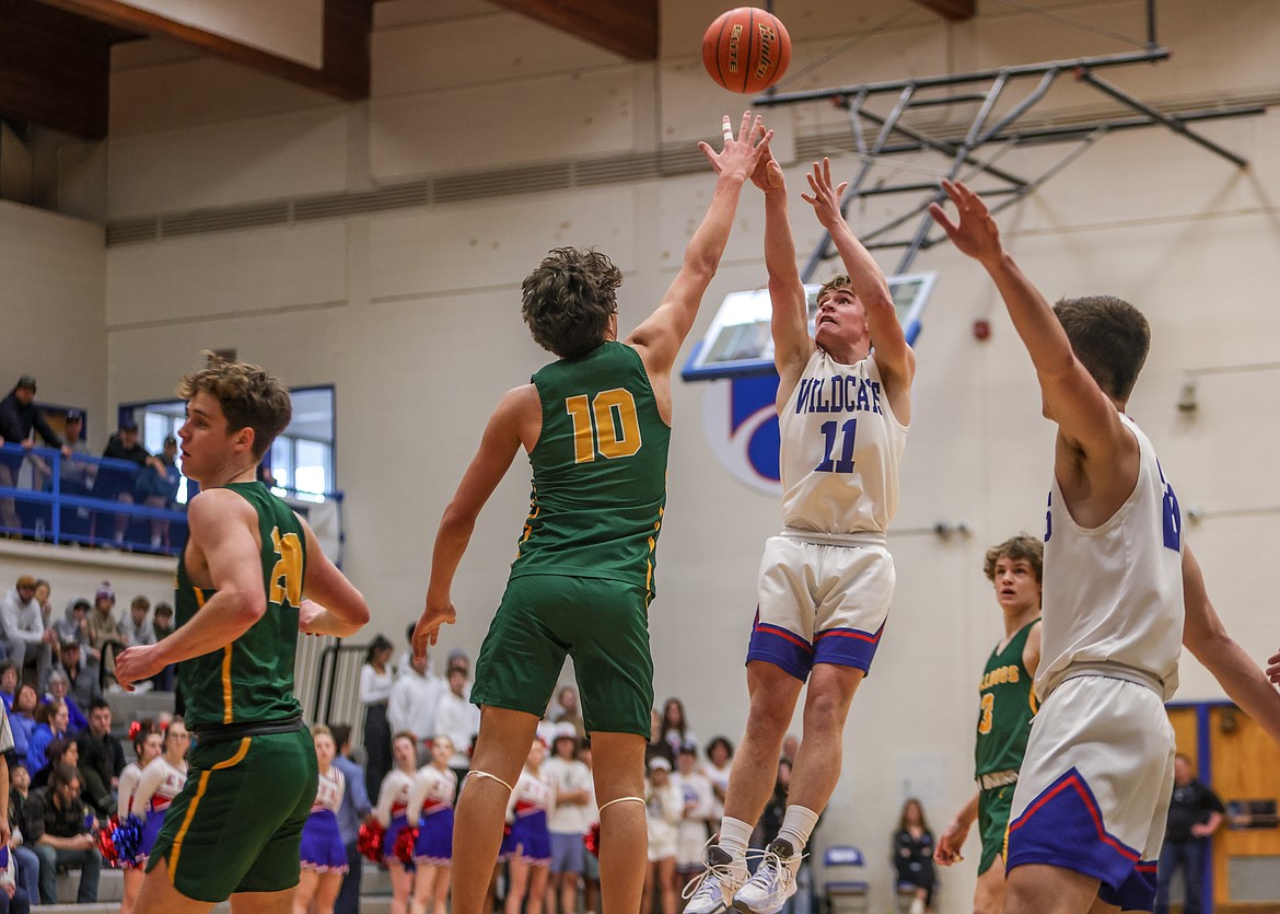 Junior Mark Robison takes a shot at home against Whitefish on Saturday. (JP Edge photo)