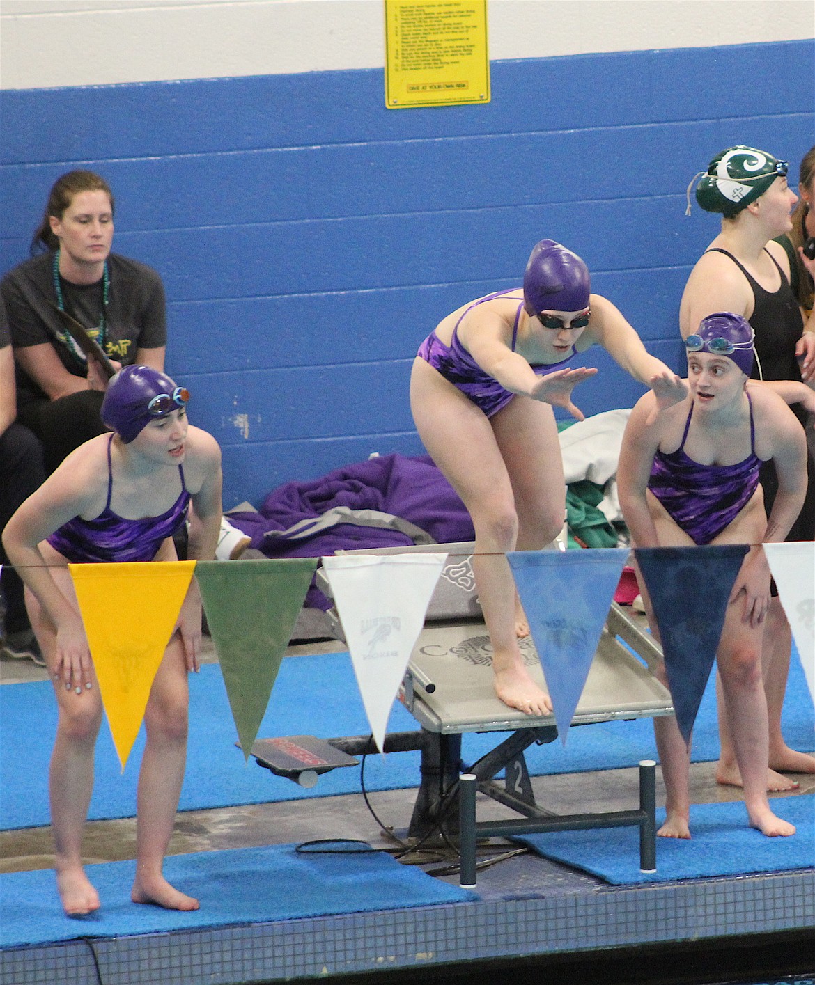 Hope Morrison prepares to dive during the 200-Yard Freestyle Relay. Polson girls placed fourth in the 200-yard relay and third in the 400-yard relay during the Montana State Swim Meet in Great Falls. (Tami Morrison photo)