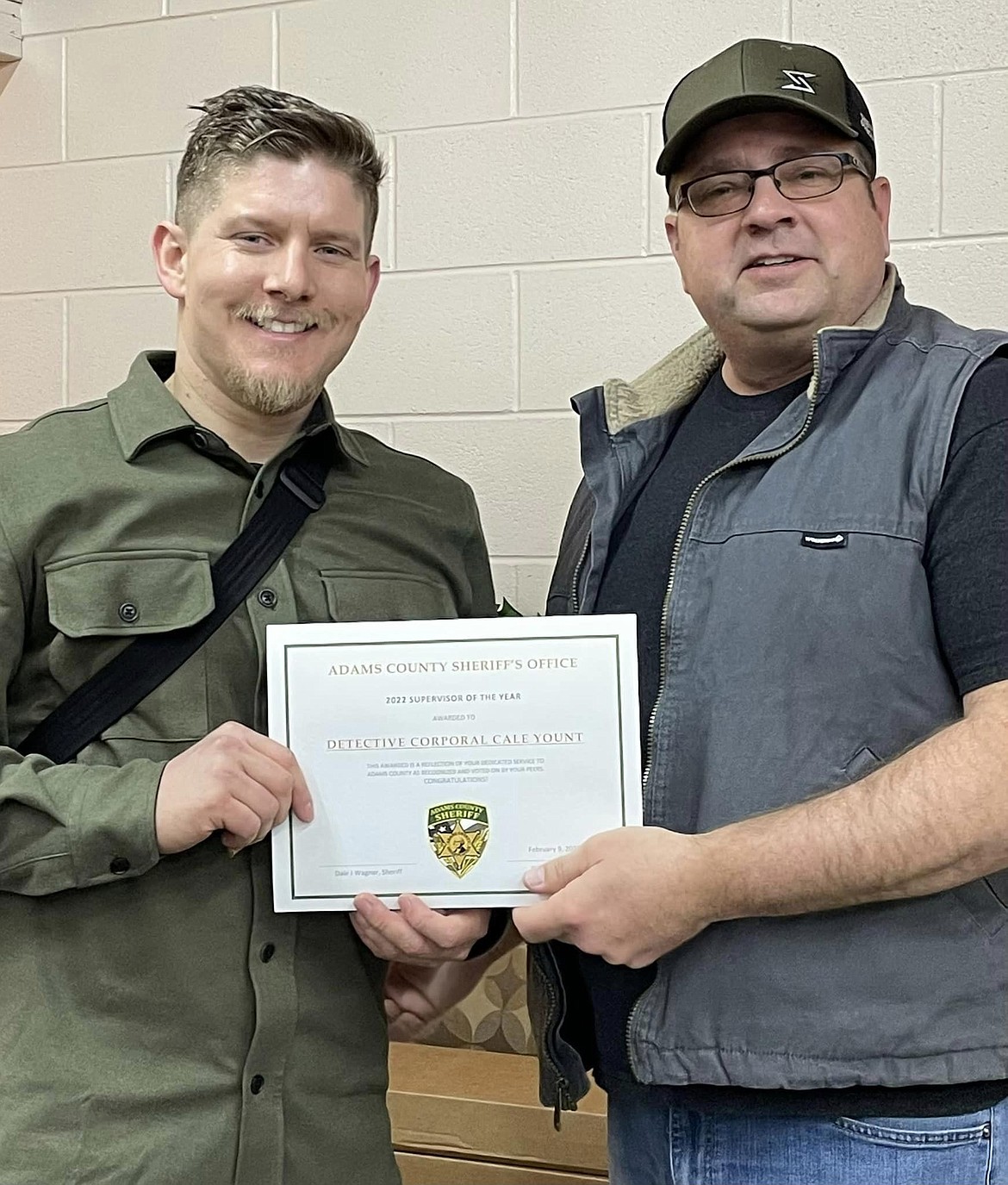 Detective Corporal Cale Yount, left, was named as supervisor of the year at the Adams County Sheriff’s Office awards dinner. The award was presented by Sheriff Dale Wagner.