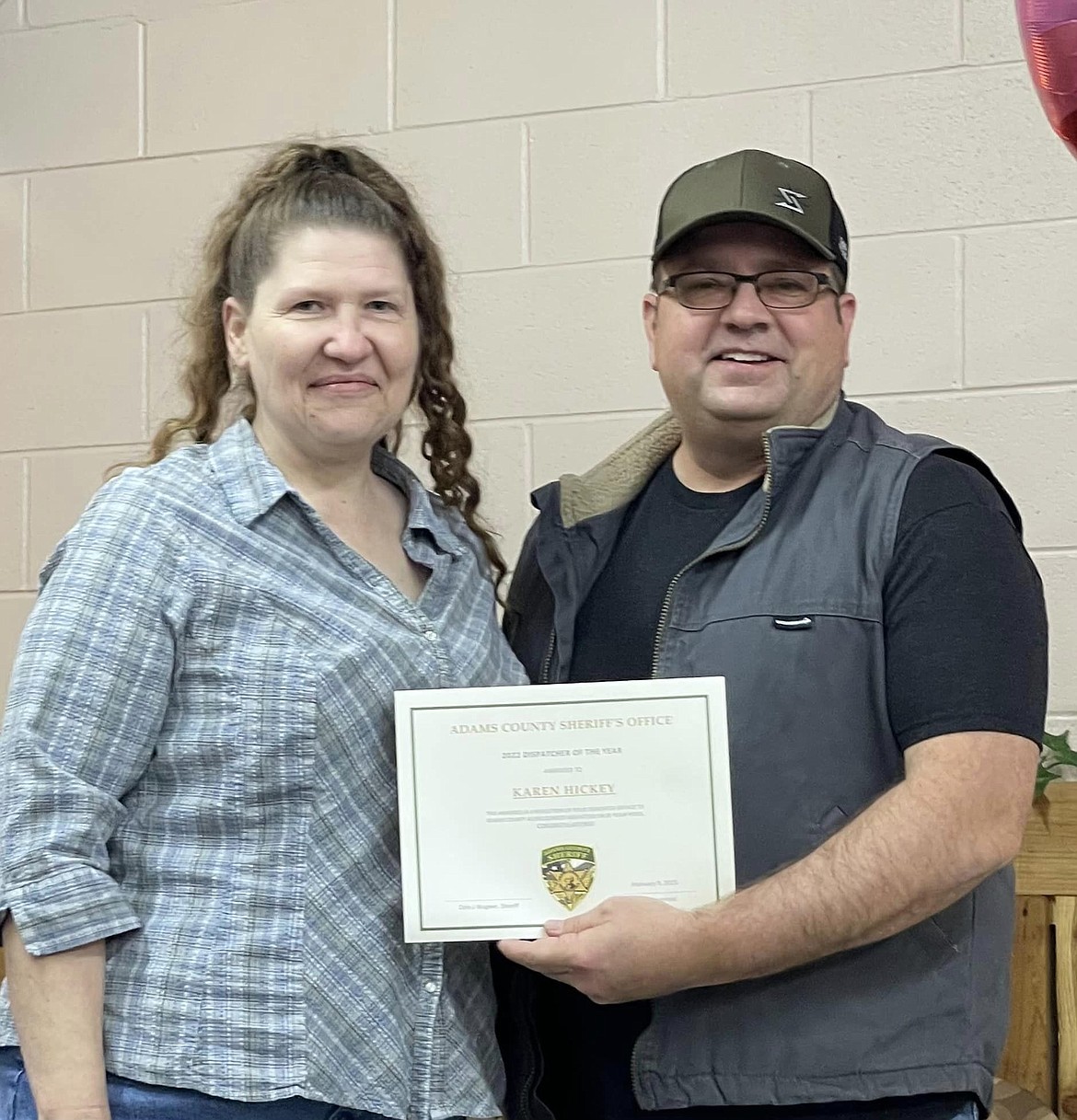 Karen Hickey, left,  was named Adams County dispatcher of the year for 2022. Sheriff Dale Wagner presented the award.