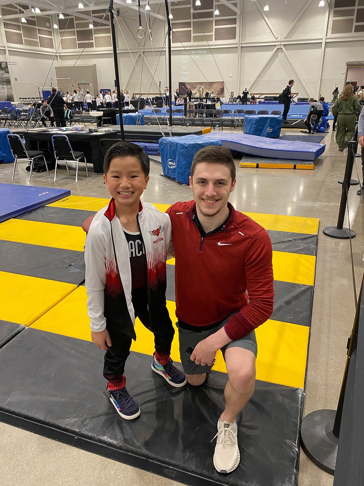 Courtesy photo
Avant Coeur Gymnastics Level 4 Preston Pool, left, with coach Matt Auerbach at the Top Gun Challenge in McMinnville, Ore.