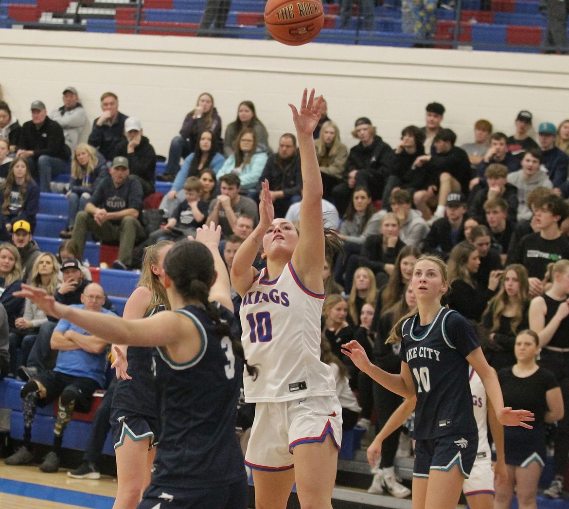 JASON ELLIOTT/Press
Coeur d'Alene senior guard Kendall Omlin splits the Lake City defense during the 5A Region 1 championship game at Viking Court on Feb. 7. Coeur d'Alene opens at state on Thursday against Eagle at the Ford Idaho Center in Nampa.