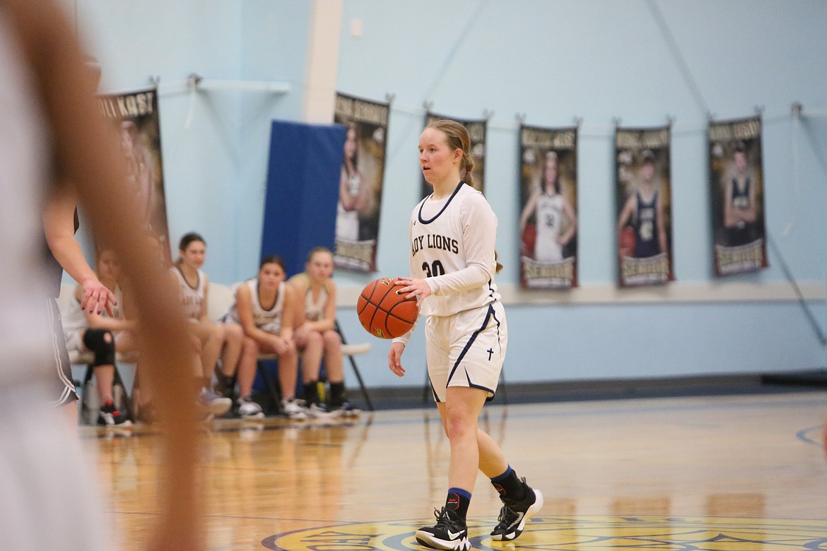 MLCA/CCS girls basketball Head Coach Josh Kast said senior guard Ali Stanley (30) “did a good job” of running the floor on offense as well as pressuring on defense in the Lion’s 62-20 win over Entiat.