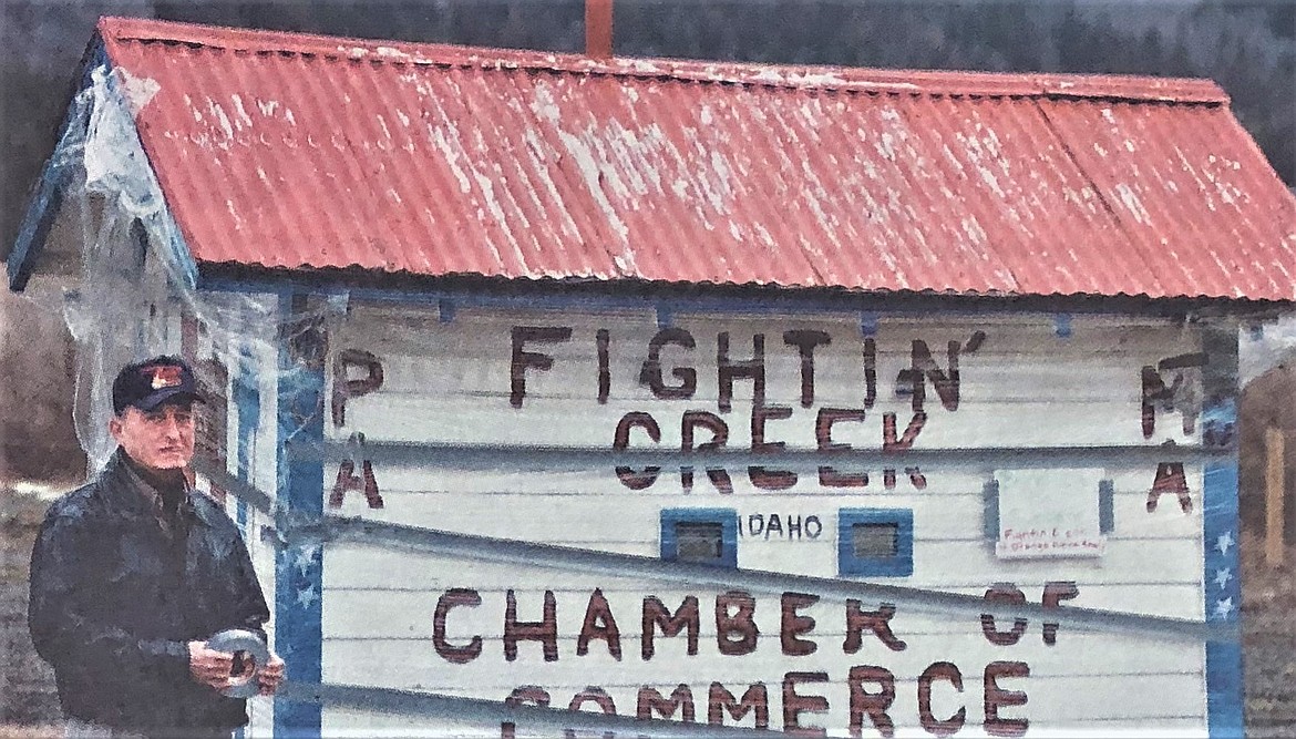 Former “Mayor” Dick Wandrocke surveys the secured Fightin’ Creek “Chamber of Commerce.”