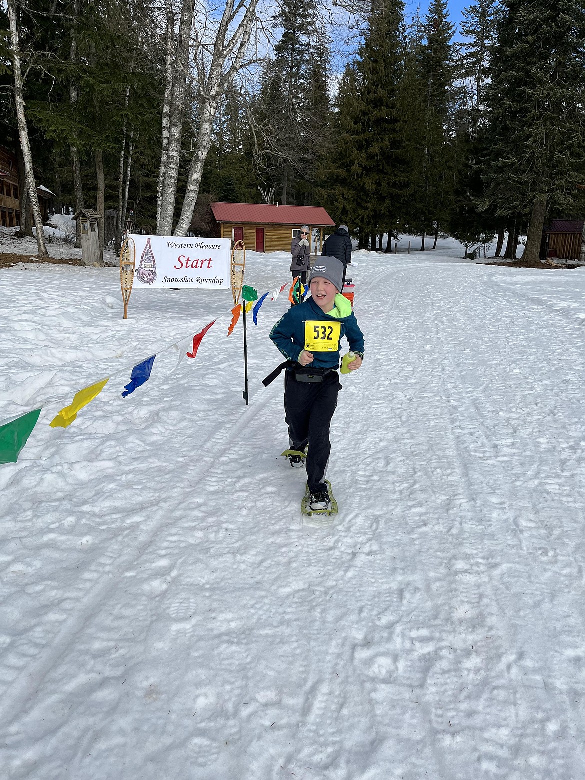 Western Pleasure Snowshoe Roundup's youngest racer, 10-year-old Gabe Otis, finishing the 5k race.