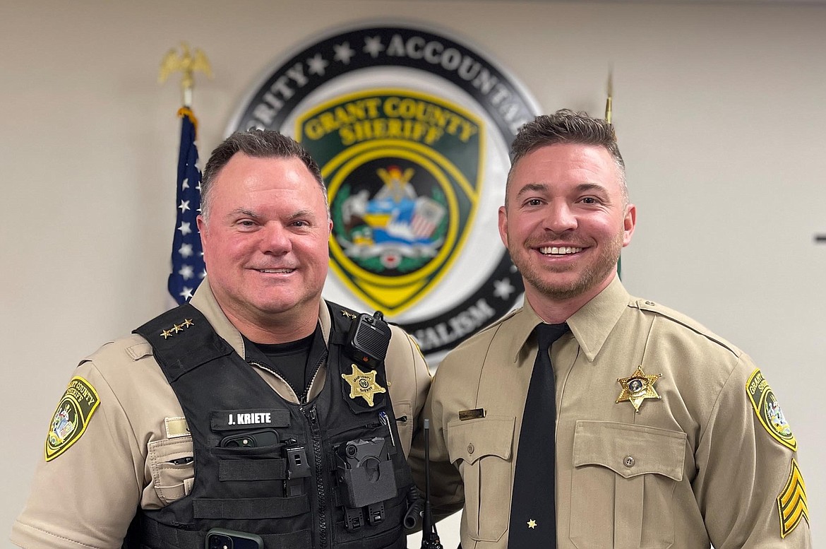 Grant County Sheriff Joe Kriete, left, swore in Sgt. Nick Overland as a new officer at GCSO. The ceremony was attended by Overland's family and friends.