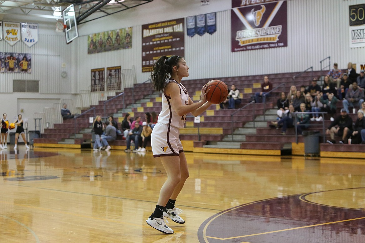 Moses Lake sophomore Kaiya Char attempts a three-pointer during the first quarter against West Valley (Yakima) on Tuesday night. Char hit a three in the fourth quarter to give the Mavericks a 10-point lead with just over one minute remaining in the game.