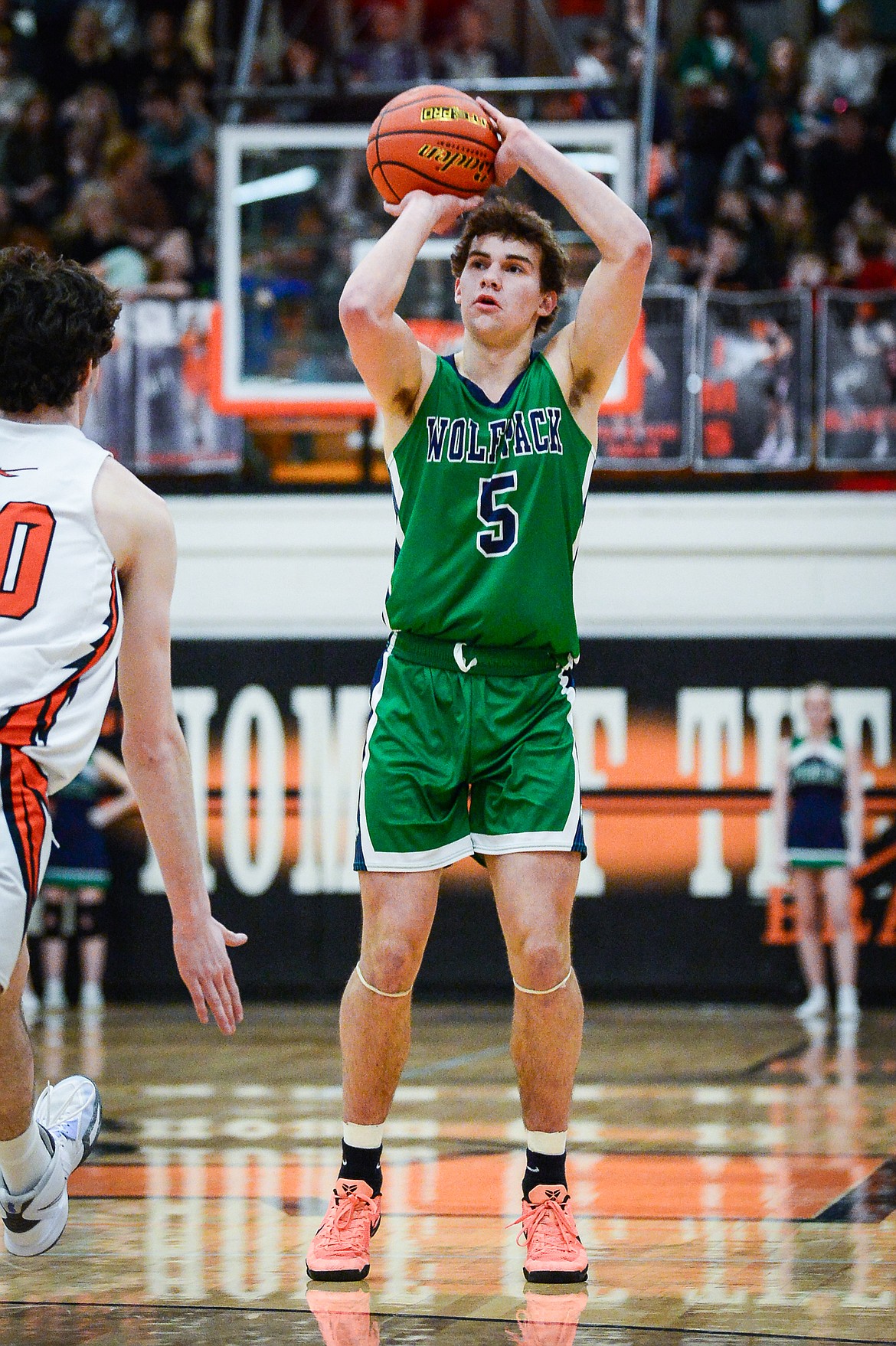 Glacier's Ty Olsen (5) shoots a three in the first half against Flathead at Flathead High School on Thursday, Feb. 16. (Casey Kreider/Daily Inter Lake)