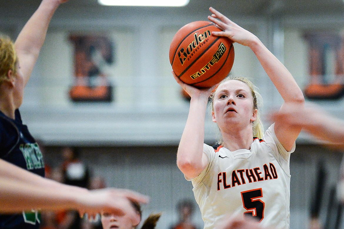 Flathead's Maddy Moy (5) shoots in the first half against Glacier at Flathead High School on Thursday, Feb. 16. (Casey Kreider/Daily Inter Lake)