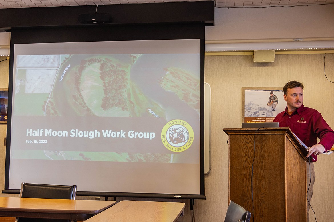 Montana Fish, Wildlife and Parks information and education program manager Dillon Tabish prepares to host a citizen work group for the Half Moon Slough on Wednesday, Feb. 15, 2023 in Kalispell. (Kate Heston/Daily Inter Lake)