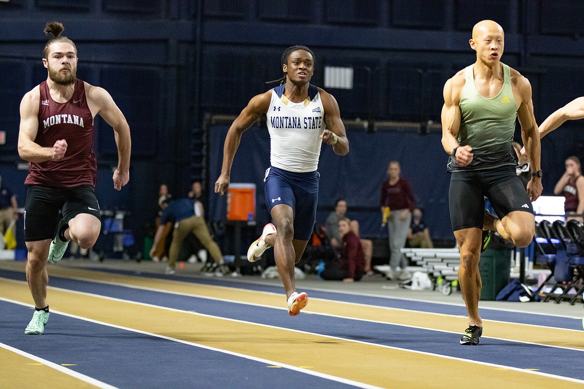 Teagun Holycross sprinted in the 60-meter final for the University of Montana recently. Holycross, pictured left, competed against professional track and field athlete Jeff Chen, pictured right.