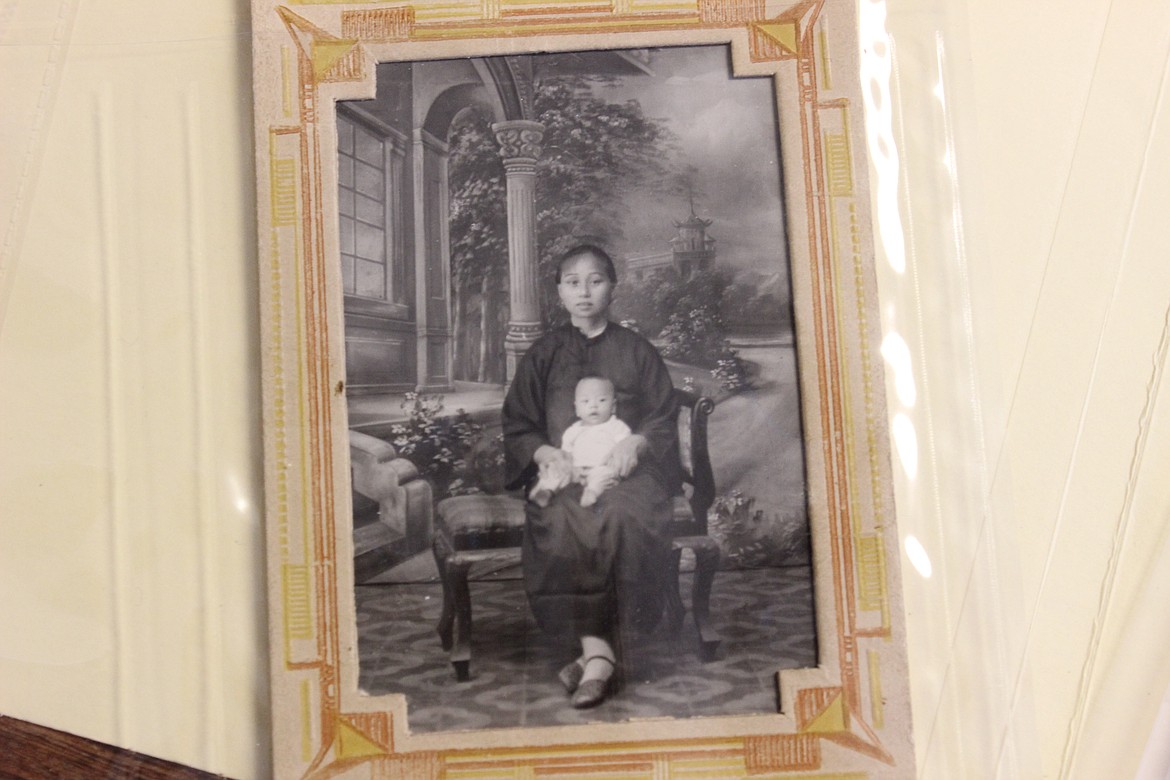 A young woman holding a baby. (Courtesy of the Northwest Montana History Museum)