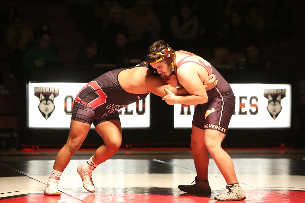 Moses Lake senior Ashton Sanchez, right, was one of six Maverick boys wrestlers to qualify for the 2023 Mat Classic.