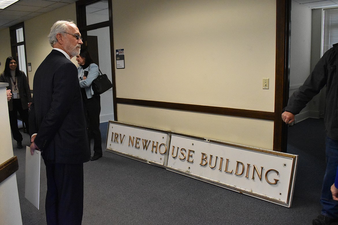 The Irv Newhouse Building sign was removed in anticipation of its demolition and given to the Newhouse family.