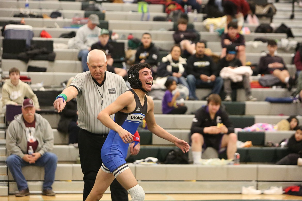 Warden senior Gio Castro, in blue, is one of seven Cougar wrestlers to qualify for the 2023 Mat Classic. Castro will wrestle in the 106-pound bracket.