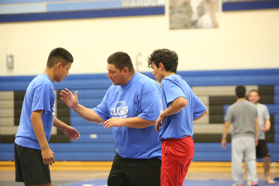 The Cougars began preparing for the season back in the summer when they hosted a camp for wrestlers with instruction by four-time state champion Chris Castillo.