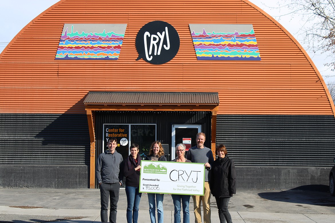 Whitefish Community Foundation presented Center for Restorative Youth Justice with a $95,000 grant to support a new program coordinator who will work with at-risk teens in Flathead Valley public schools. From left to right are Alan Davis, Ashley Tetu, Claire Peterson, Catherine Gunderson, Ben Johnson and Jill Seigmund. (Courtesy photo)