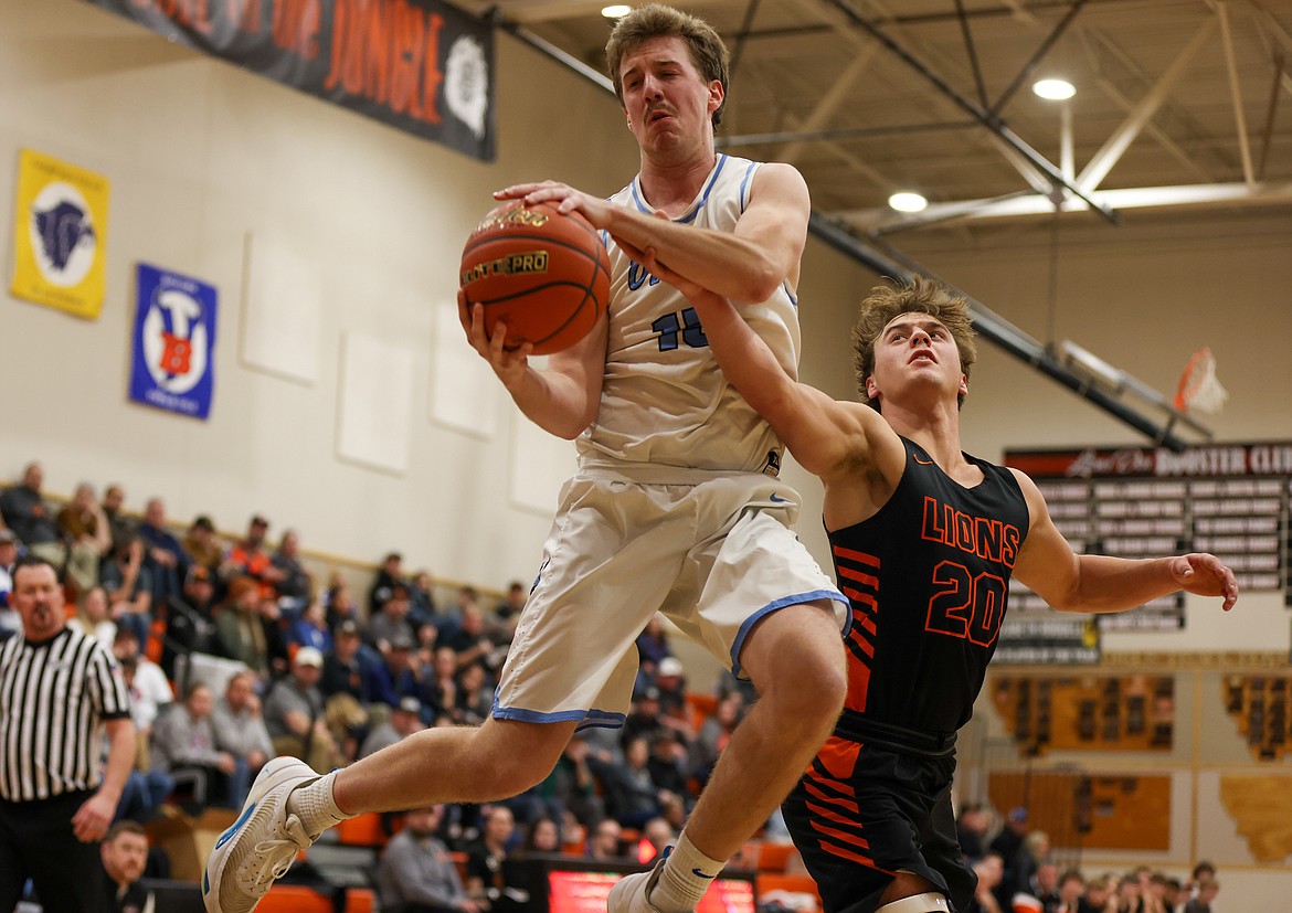 Bigfork’s Bryce Gilliard goes up for a basket in the District 7-B boys championship game on Saturday in Eureka. (Jeremy Weber/Daily Inter Lake)