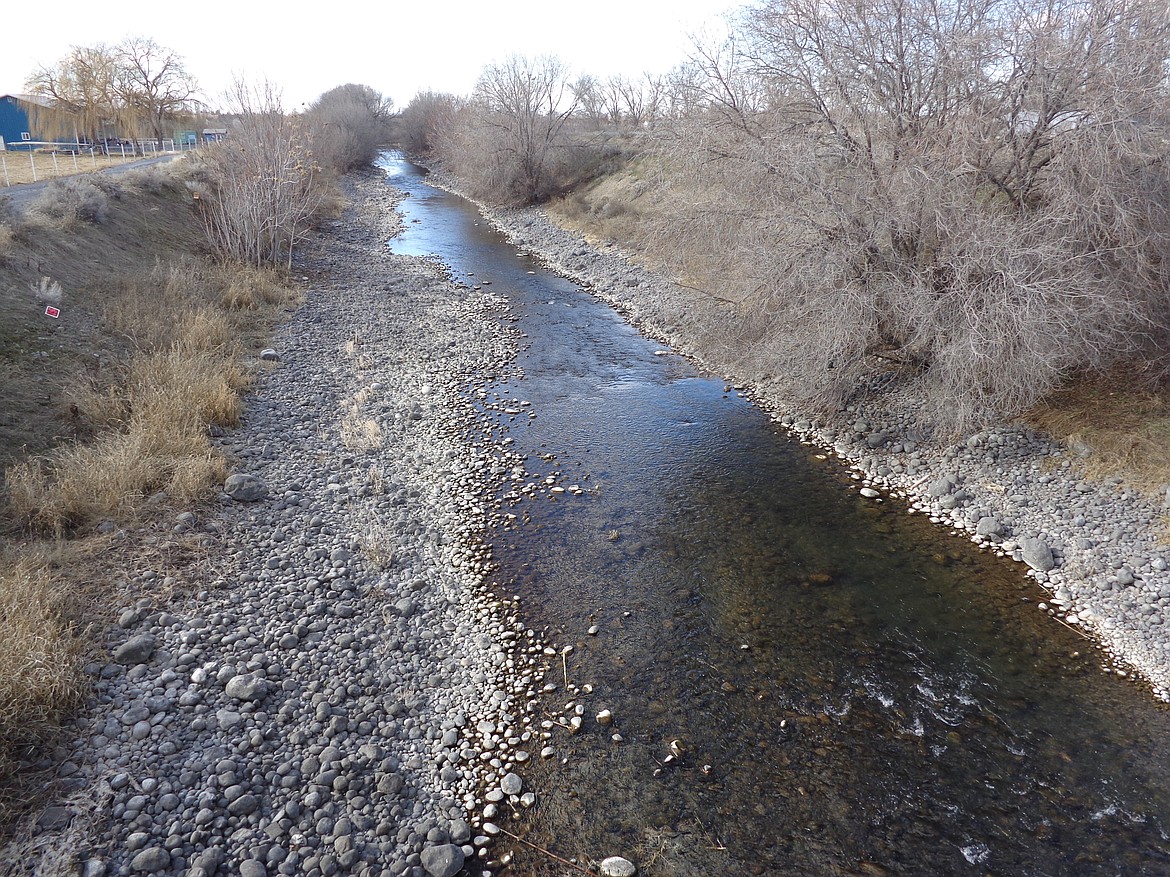 Water flowing down Rocky Coulee Wasteway on Saturday as it passes under Road L NE, just north of Moses Lake. The wasteway is used by the East Columbia Basin Irrigation District to move water from the East Low Canal into Crab Creek and then through Moses Lake into Potholes Reservoir, where it will eventually supply irrigation water to farmers in Adams, Franklin and Benton counties.